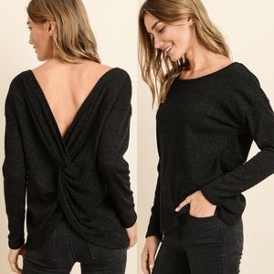 Classic black top with open back and shimmer